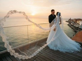 Poročna obleka, poročno fotografiranje, poroka ob morju