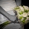 Poročni šopek in poročni prstan.